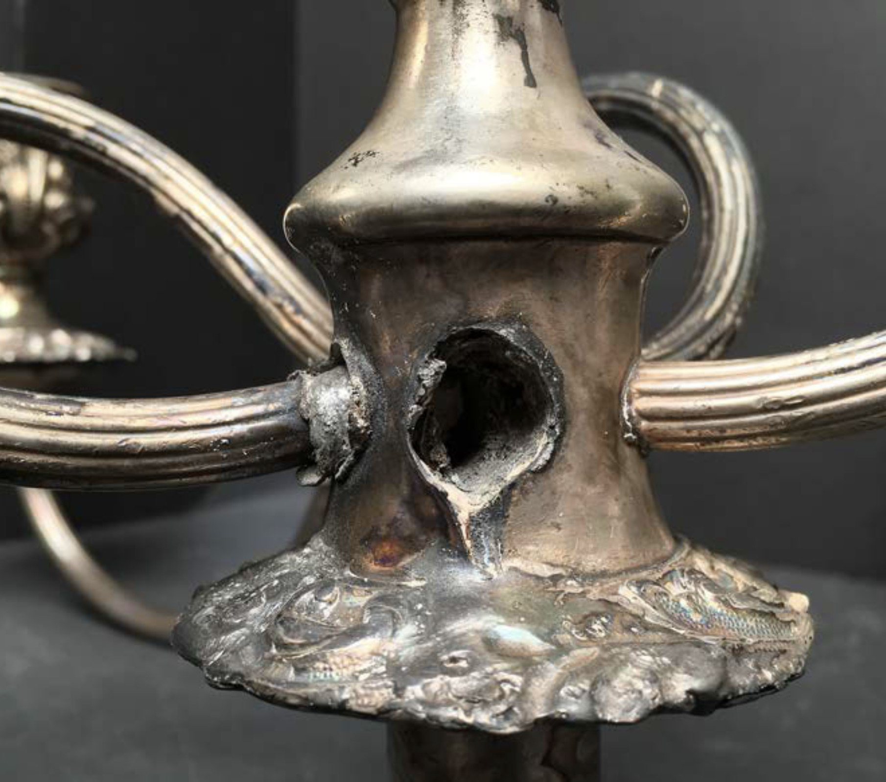 A sheffield candelabra before treatment.
